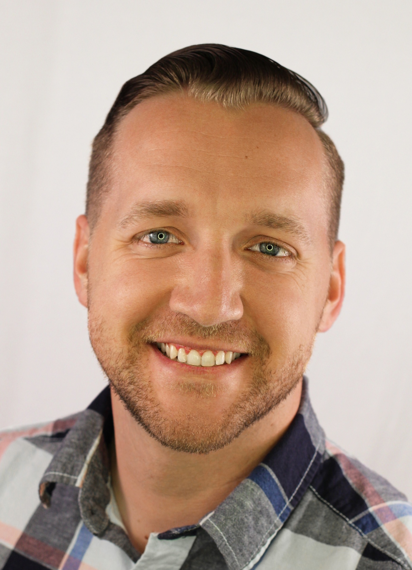 Portrait of Kevin Clark, owner and operator of Vox Veritas Media